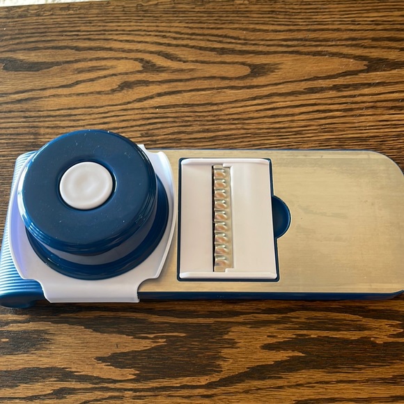 Kitchen Mandolin With Multiple Blades And Graters Spring Loaded